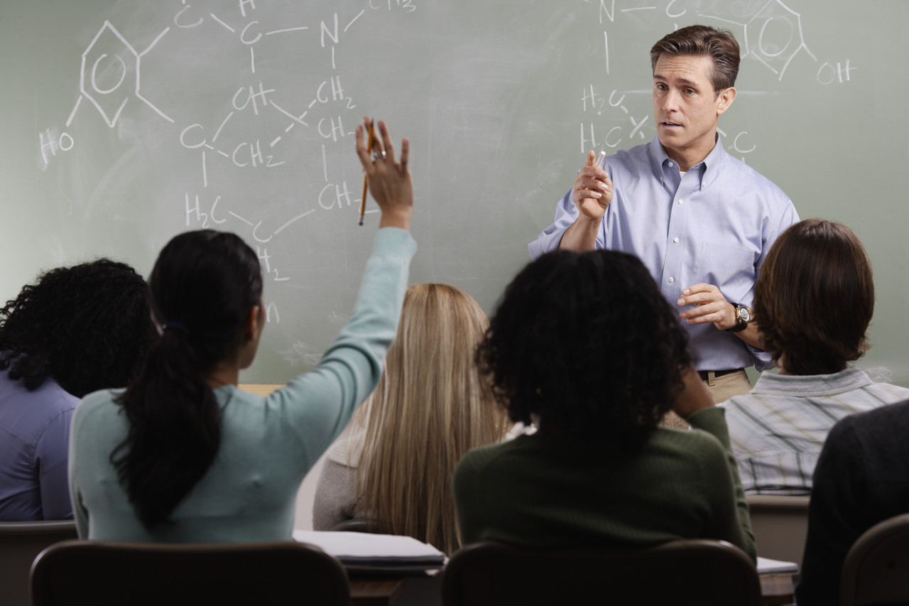 Chemistry Teacher With Students In Class